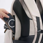 Plecak panorama buttermilk beige and black backpack with mesh panels and zippered side pocket holding iphone in clear case